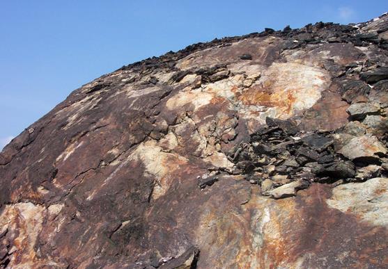 Granite: Acid/felsic igneous rock; coarse-grained (holocrystalline); large-scale intrusive (plutonic).
