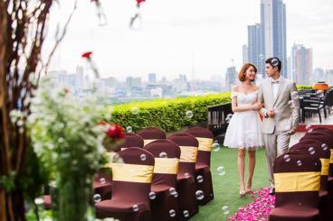 23 rd floor, with the stunning Bangkok skyline as the backdrop to their special moment.