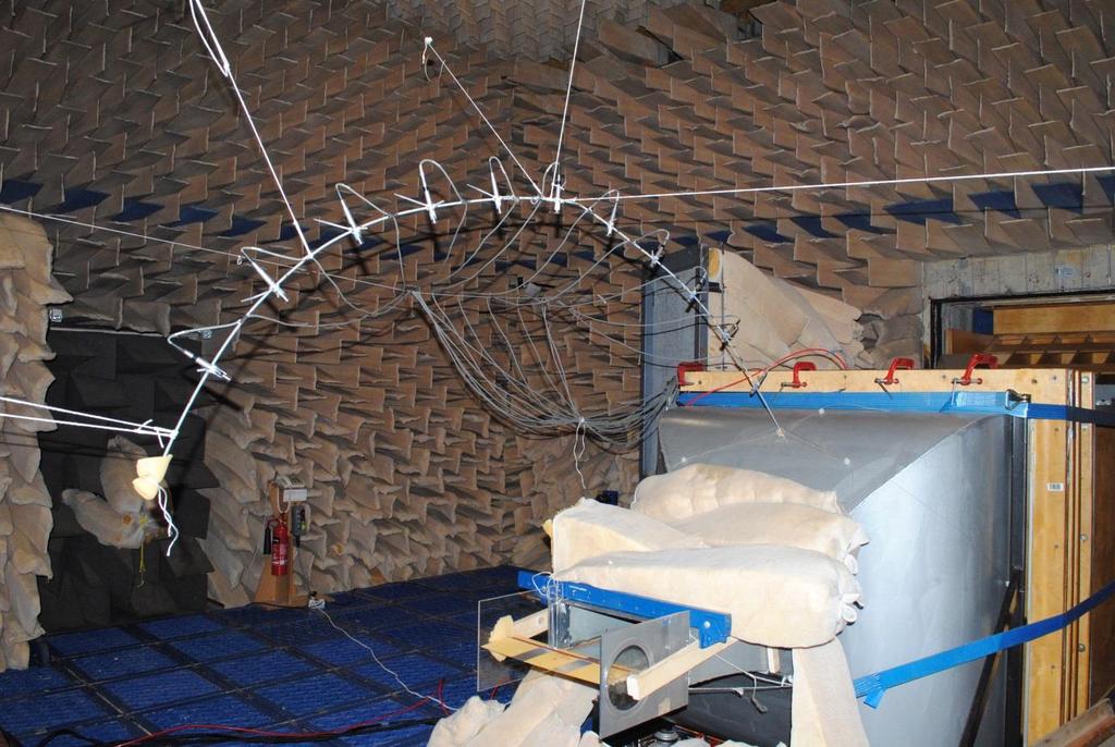 2.2 Jet test facility and instrumentations A photograph of the open-jet test facility inside the ISVR s anechoic chamber, with dimensions 8 m x 8 m x 8 m, is shown in Fig. 2.