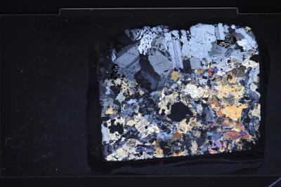 The alteration intensity of this thin section is substantial. Magmatic texture marked by minor crystal-plastic features.