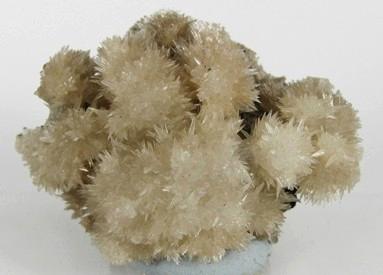 Q25. (a) Read the article about the mineral strontianite. Strontianite is a mineral that was discovered near the village of Strontian in Scotland.