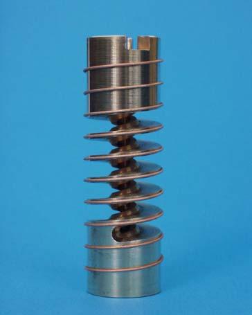 3 Figure 1 Photograph of a superconducting strand mounted on a tee-shaped spring (diameter: 22 mm). gasket and knife edge seal between the can and the outer shaft.