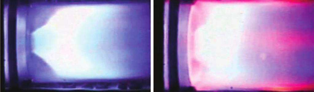 Fig. 23. State change in a swirled laboratory flame due to a variation of inlet temperature T in [163]. Left ( T in = 570 K): the ORZ (outer recirculation zone) contains cold gases.