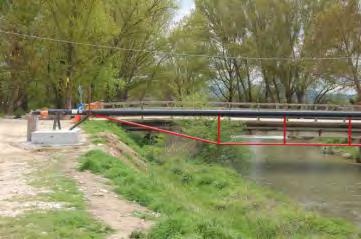 gas pipe connected to a damaged bridge in Onna (AQ) replaced with a