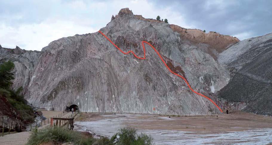 Figure 13 Trace of the shear zone (red line) at outcrop, probably corresponding to the shear zone in the mine gallery (Figure 12). P-wave velocities parallel and perpendicular to the bedding is 5%.