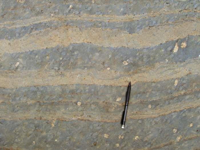 Small Falls Formation In Figure 6 thin brown quartzite alternates with thicker gray schist.