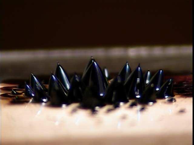 Free surface phenomena in ferrofluids