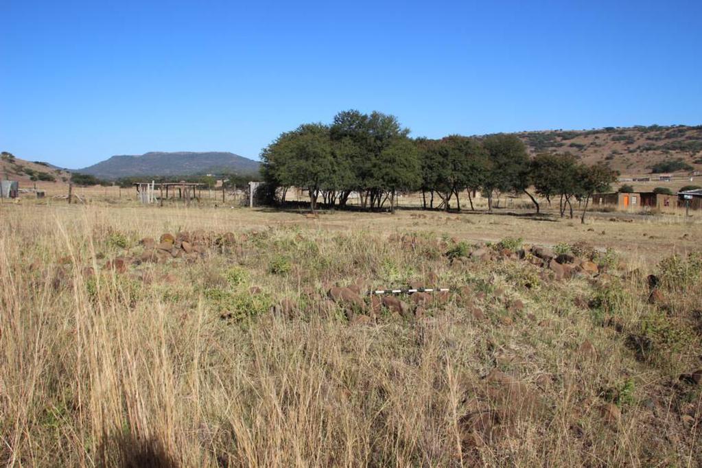 Page 24 of 71 LOM01 LOM01 is located at the base of a hill where the southern reservoir is located, south of Umbulwana. The site consists of two circular stone walled enclosures (fig. 9).