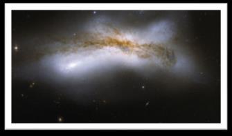 One worth searching for is NGC520, the Whirligig Galaxy.