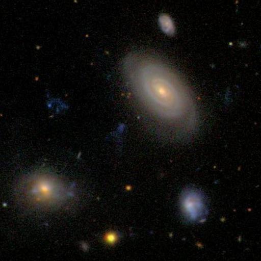 The BLUE INFALLING GROUP is a compact group of galaxies