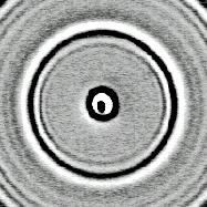 by thermal evaporation. The concentric series of rings arises because of the 12.5 ns period for the arrival of pump optical pulses at the centre of the pattern.