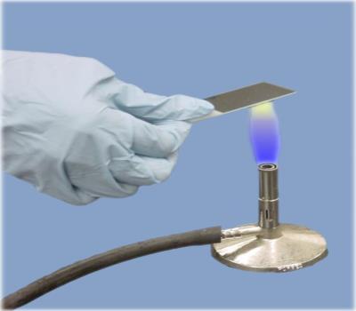 that, we have to leave the slide to air dry for one minute then use the Bunsen burner flame which fixates the bacteria on the flame.