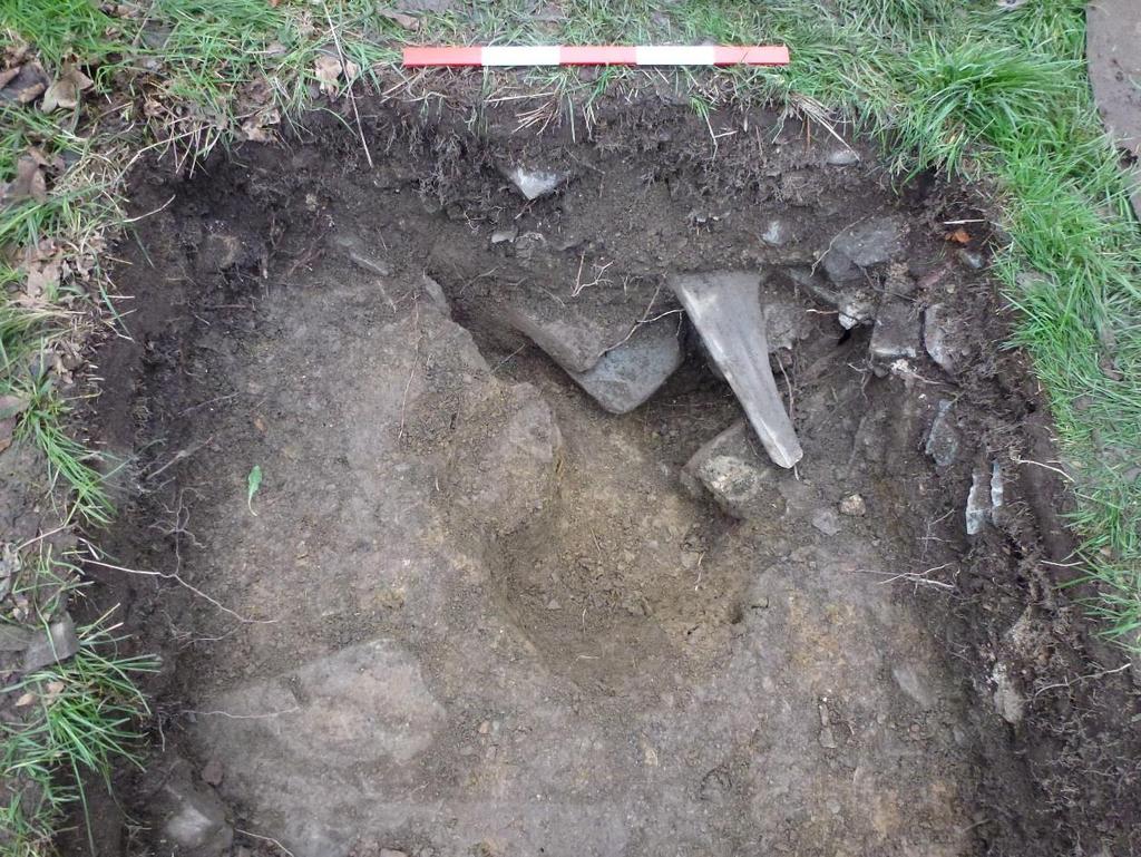Excavation in Trench 2A (see below) revealed that an identical deposit of mineral subsoil (i.e. 225) had been used to create a terrace apparently associated with the earlier phase of landscaping.