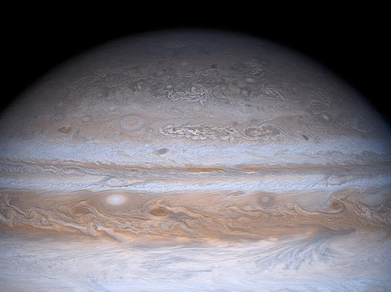 Cassini image of Jupiter showing small scale eddies and larger