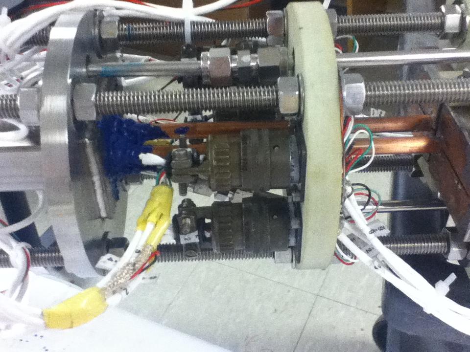 Figure 3-8: Instrumentation wires connectors and top flange of the vacuum canister.