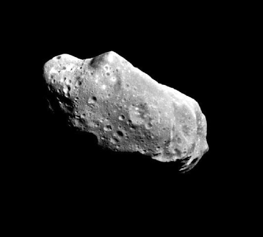(4) (b) The photograph shows the asteroid Ida taken from a space probe.