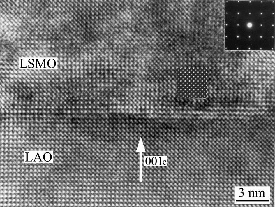FIG. 1. Typical HREM image along [100] c direction of the LSMO film on LAO substrate before the irradiation.