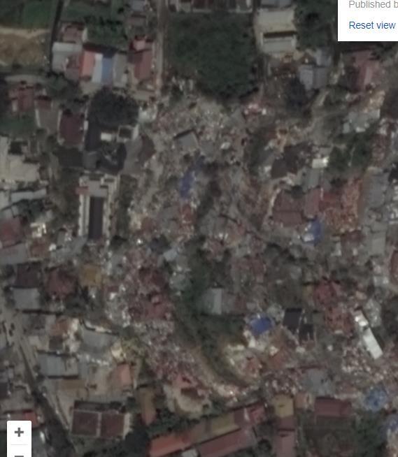 Alt+40m At the toe of landslide, so many collapsed houses are swept