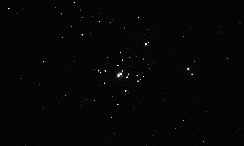 It s a very young but bright cluster dominated by a handful of mag. 7 and 8 member stars and including a close bright binary pair (SAO 13031, mag. 6.95; SAO 13030, mag. 7.08).