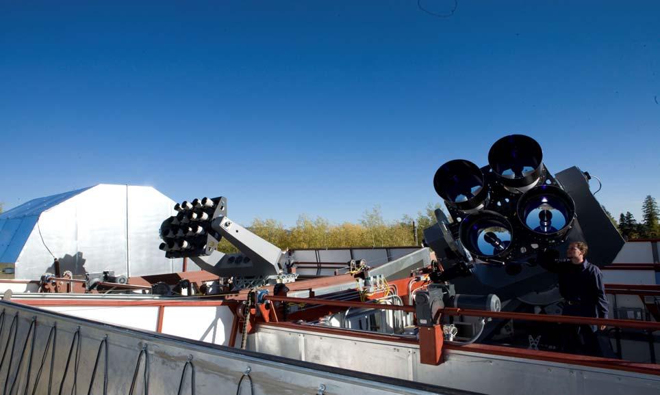 Figure 3. The RAPTOR-T multi-color follow-up telescope array (foreground) and the RAPTOR-K sky monitoring array.
