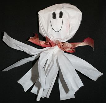 give them two glue dots and two big wiggle eyes and they have an adorable keepsake. punch a hole in the top and hang them from the ceiling. The poem wrote says: Here's a little ghost he says boo!