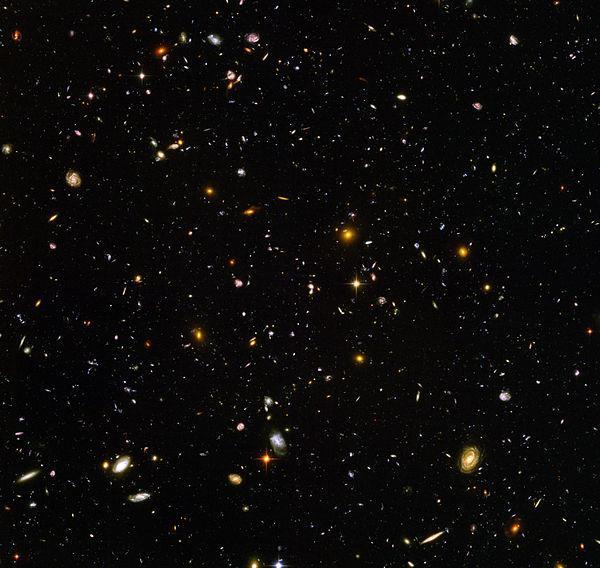 The Hubble Deep Field Photograph The Hubble Space Telescope observed a tiny patch of empty space (imagine liking through a straw) for a week. This is the image it took.
