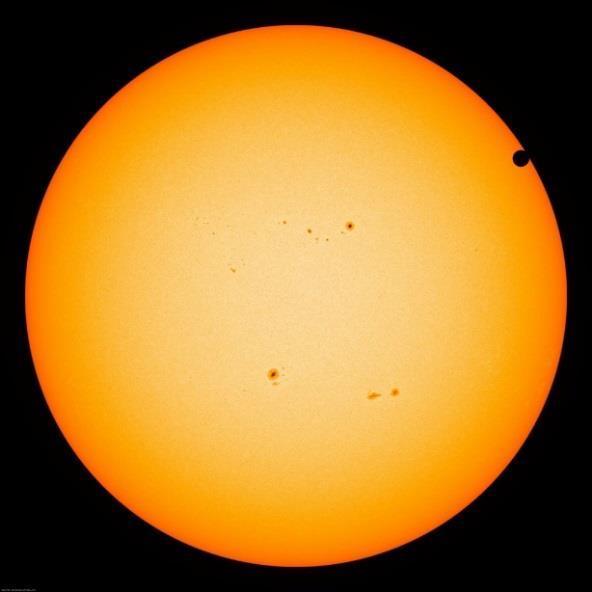 1). Figure 6.1.1 A NASA SDO image of the Sun with Venus in transit ( Astronomy Picture of the Day, 2012) Figure 6.1.1 shows Venus transiting across the Sun and it can be clearly seen that rather than being a disk of uniform brightness, the Sun grows darker towards the edges.