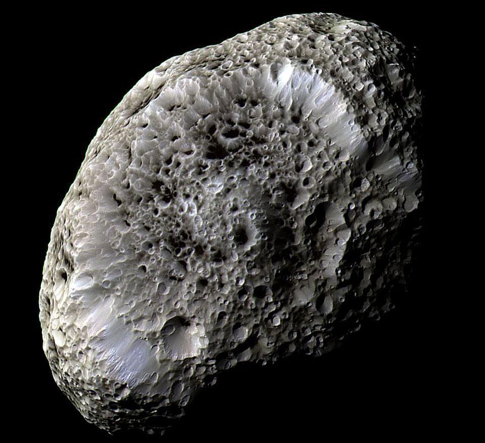 Hyperion, one of Saturn s moons Photographed by the Cassini