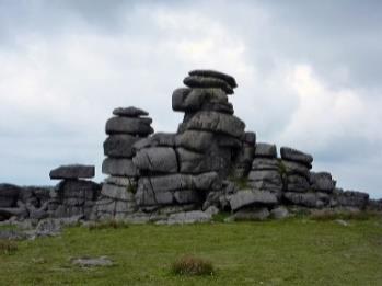 What are tors? A block of granite found at the top of a hill. What are clitter slopes?