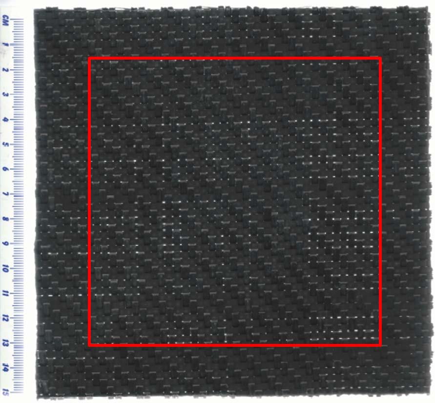 Figure 2. Digital image of a single ply 2/2 twill woven carbon-epoxy composite. Warp and weft tows are respectively positioned horizontally and vertically.