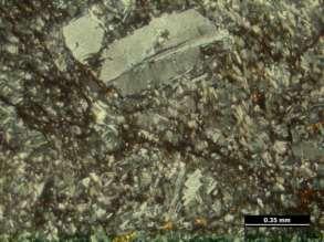 The petrography of pillow basalt shows larger phenocrysts of subhedral clinopyroxene in groundmass of finer crystals of plagioclase and pyroxene (Figure 2).
