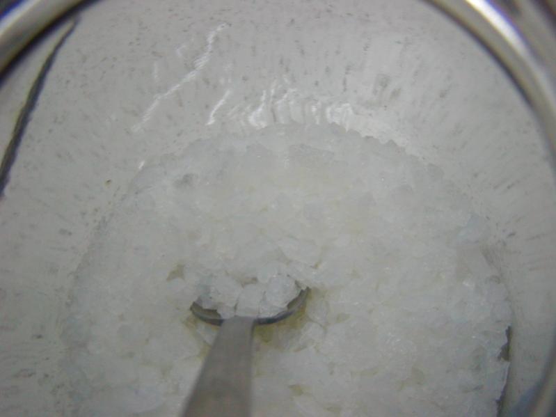 the grinding and packing of silica nanospheres into glass containers.