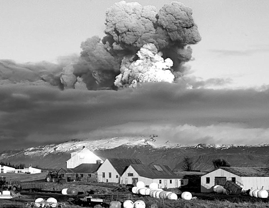 4 (b) Fig. 1.2 contains information about the eruption of Eyjafjallajokull in Iceland (March 2010).