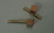 Thermocouple holes (a) Copper contact Brass rod (b) Figure 5.