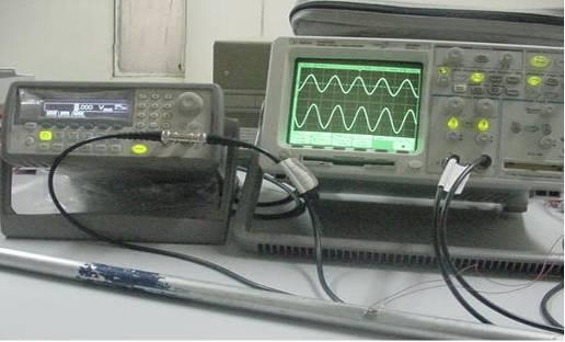 Function generator Mixed signal oscilloscope Specimen PZT