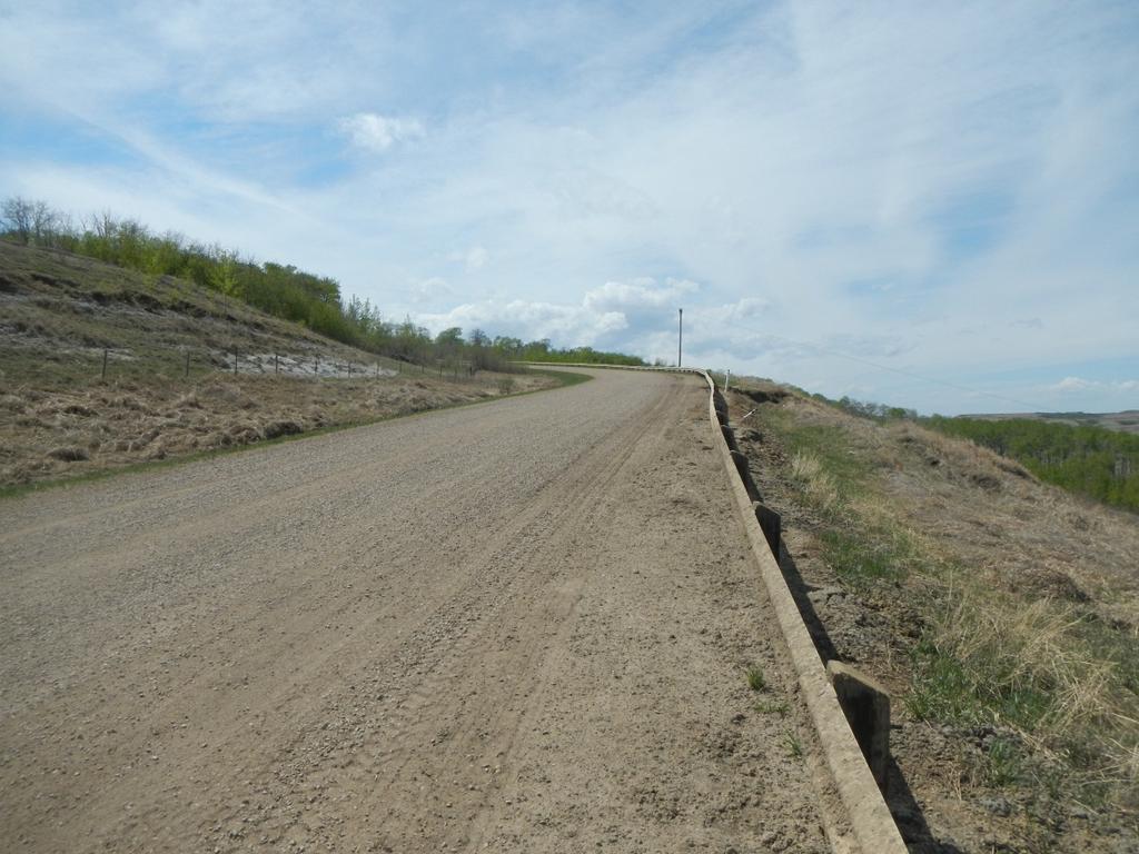 2 SITE OBSERVATIONS On May 15, 2013, no slide activity was apparent within the highway as shown on Photograph 1.