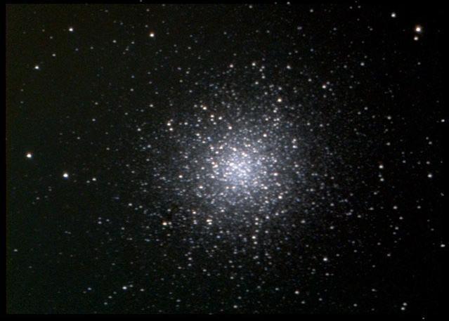 It is just visible using a good pair of 9 x 50 binoculars. The cluster of about a million stars can be seen using a 90mm f10 telescope but will look very impressive when using a larger telescope.