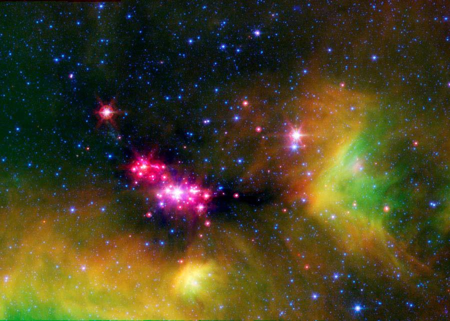 The Infrared Universe as Seen by Spitzer and Beyond The Holly Berry Cluster [NOT the Halle Berry cluster] in Serpens