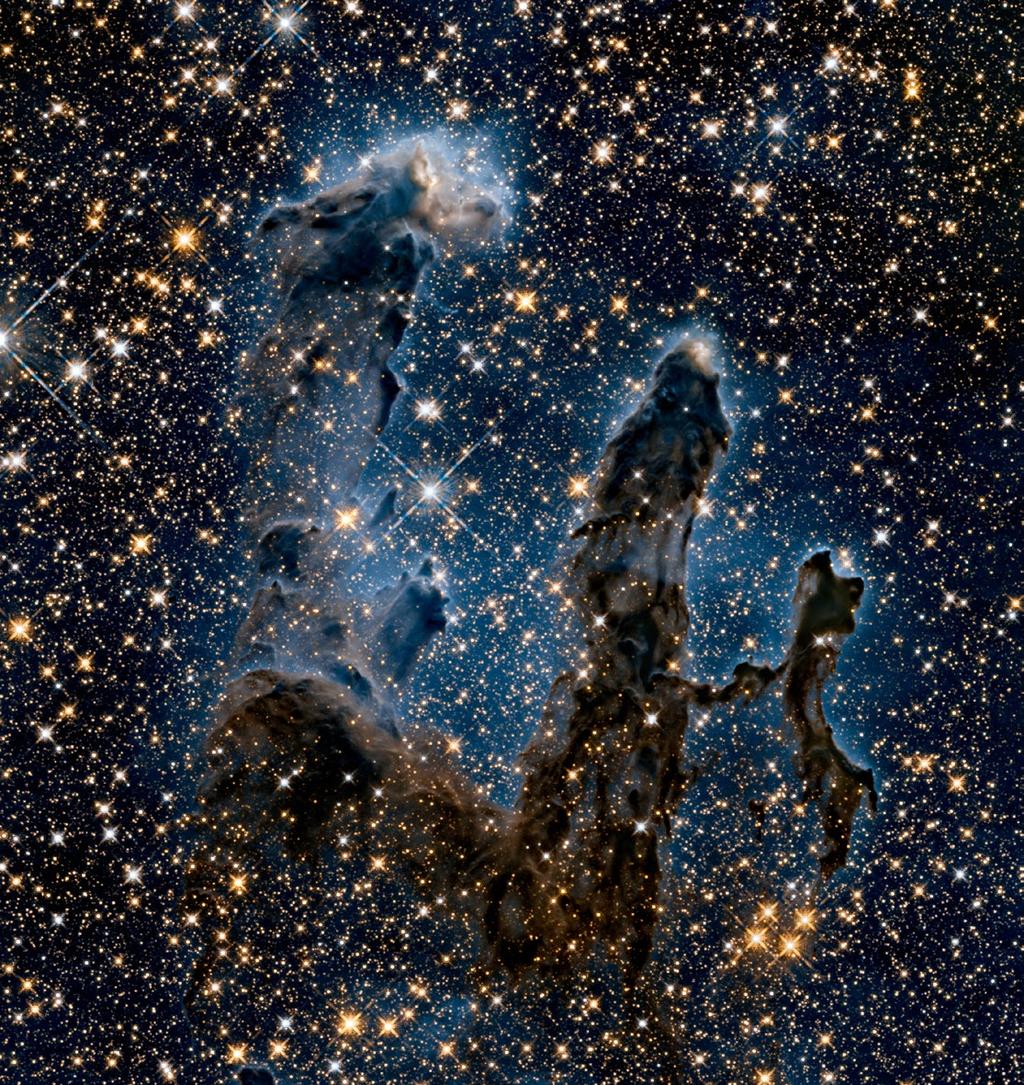They will also be able to observe within very dusty environments where stars and planets form, like this one The Eagle nebula - visible The Eagle nebula - invisible Webb was designed to tackle some