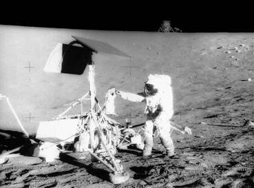 During the Apollo 12 mission in 1969, commander Pete Conrad retrieves equipment from the Surveyor 3 probe, which landed on