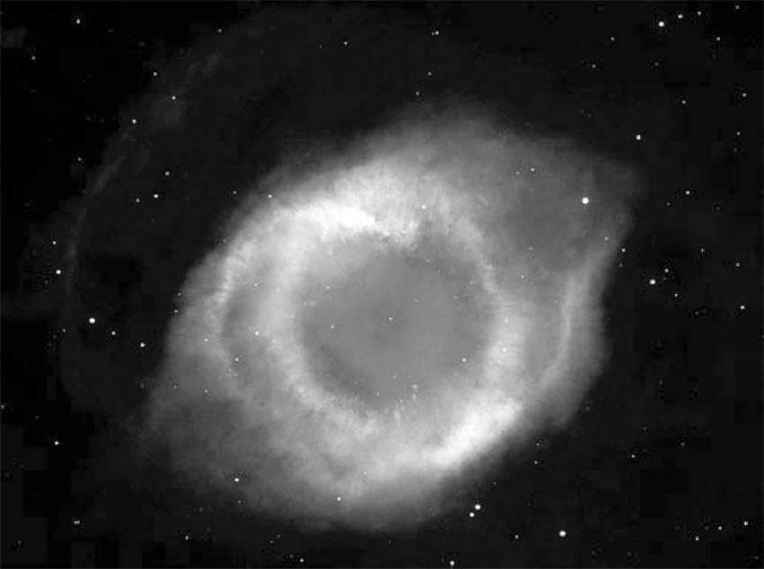 15. The photograph shows the Helix Nebula, a typical planetary nebula. Image courtesy of NASA (a) What stage in the evolution of a star does a planetary nebula represent?