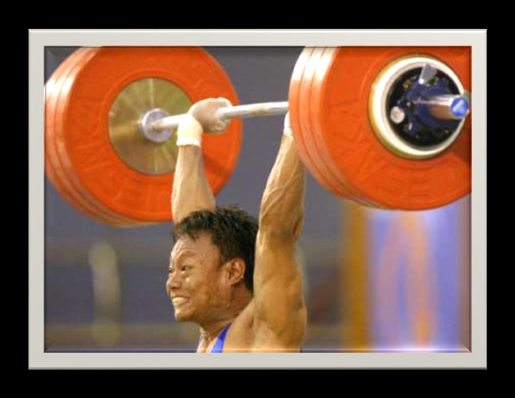 Work-Energy Theorem A weightlifter raises a barbell over his head Work is done on the