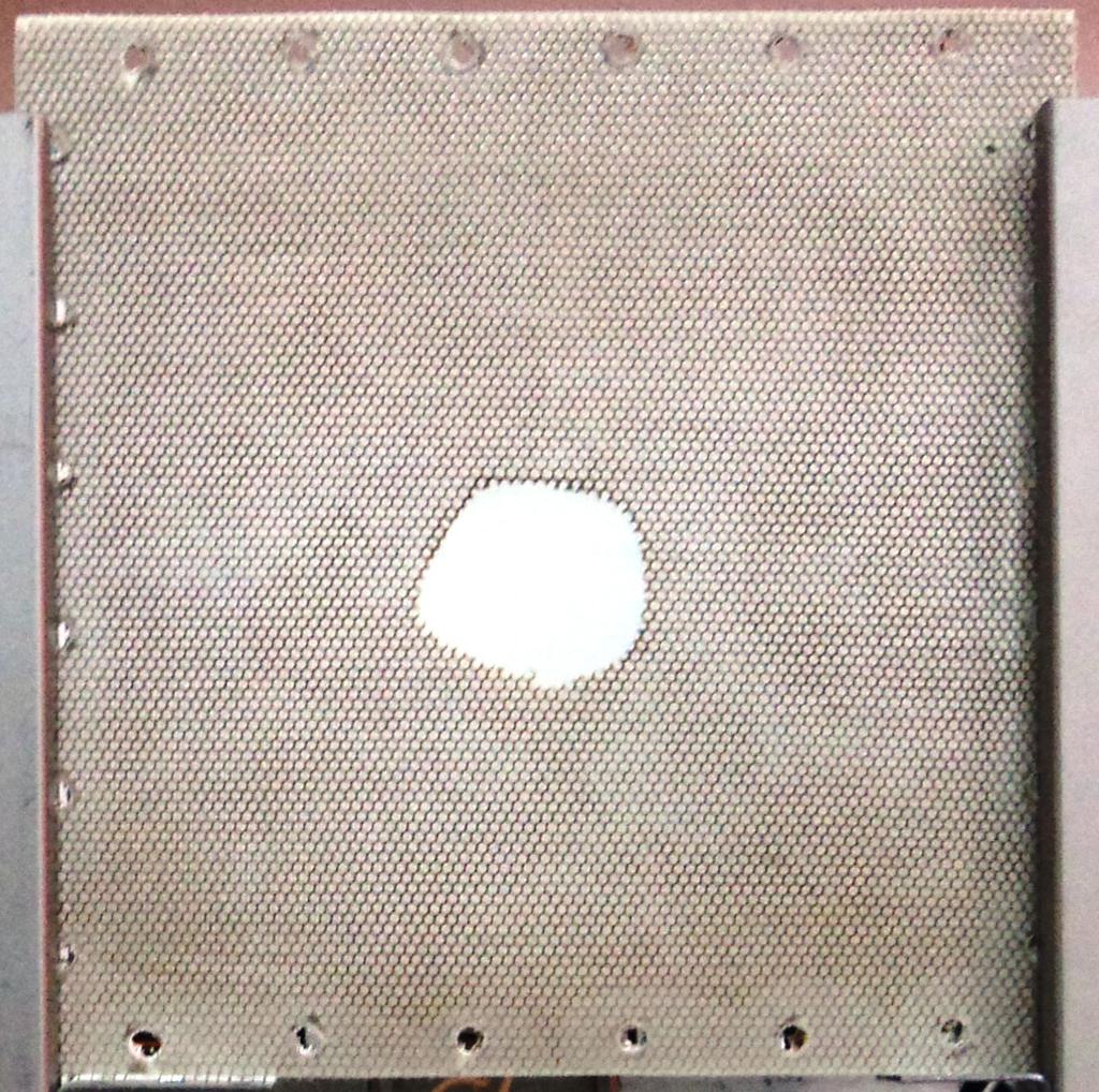 tested plate in order to clamp it on the boundary for vibration tests. Fig. 1. Overall view and magnification of the tested plate 2.