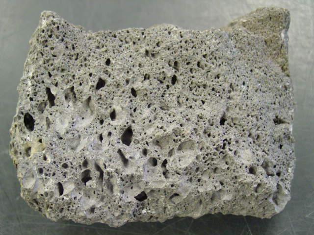 STRUCTURES IN VOLCANIC ROCKS When lava cools, escaping