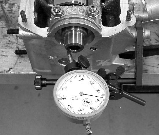 For measuring run-out, the tracer pin s movement must be perpendicular to the shaft or surface being measured. Improper dial indicator mounting (exaggerated in this view).