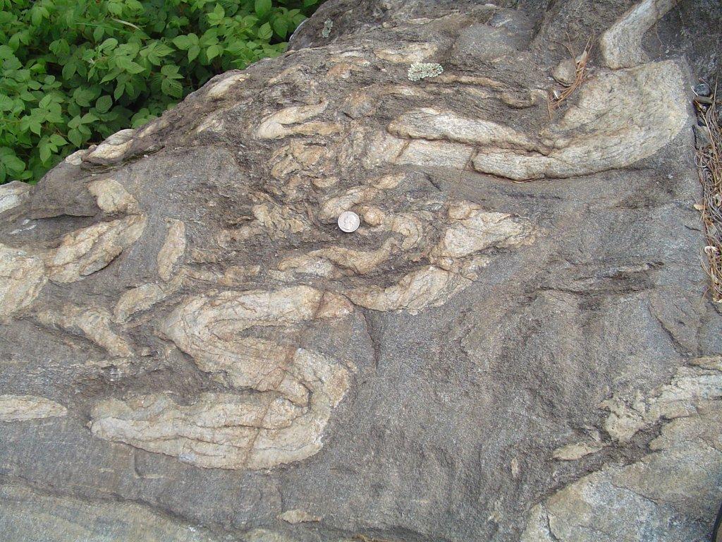 Migmatite ( 混合岩 ) The metamorphic rocks exposed in this outcrop near Michigamme, Michigan are over 3 billion