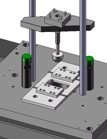 V Mass Force Sensor Specimens Rigid punch Figure 6.: Fixture and specimens developed for tensile testing of sheet metals in a drop tower.