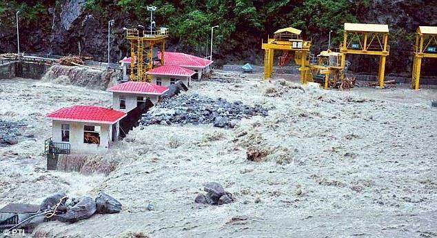 Figure 1: Vishnuprayag Hydropower Plant sluice gates being inundated and destroyed by the floods in Uttarakhand, northern India, in June 2013. (Image courtesy of www.thehindubusinessline.com).
