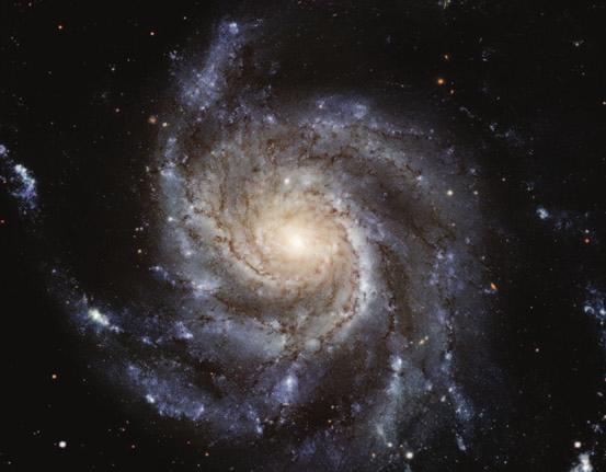 experimental reactor ITER; (b) the Pinwheel Galaxy M101 (HST, NASA-ESA).