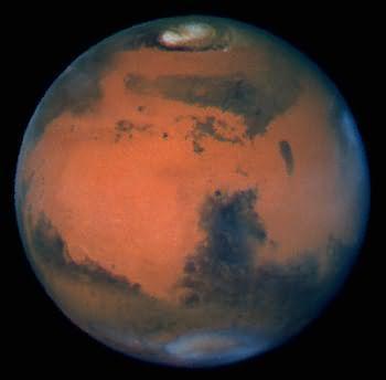 Mars:Overview Mars orbits the Sun at a distance of about 1.5 AU (Earth 1 AU).